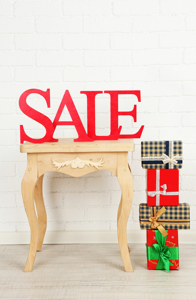 Sale with bags and gifts - Foto, imagen