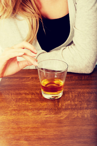 Yound woman in depression, drinking alcohol - Φωτογραφία, εικόνα