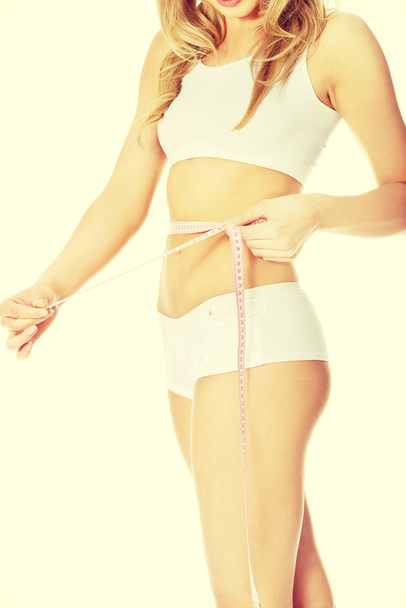 Измерение тела женщины
. - Фото, изображение