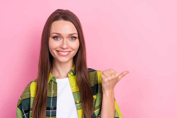 Portrait photo of cute lady promoter brown hair wear plaid yellow jacket direct thumb mockup useful tips message isolated on pink color background. - Foto, Imagem