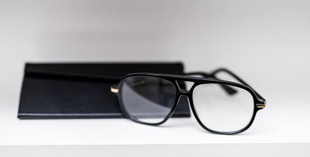 Stylish design optical eyewear. Modern glasses in store. - Photo, Image