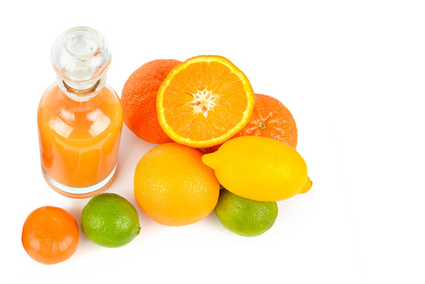 Set of citrus fruits and fruit juice in bottle isolated on white background. - Zdjęcie, obraz