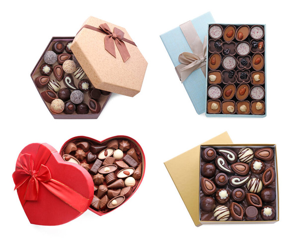 Sada krabic s chutnými různé čokoládové bonbóny na bílém pozadí, horní pohled - Fotografie, Obrázek