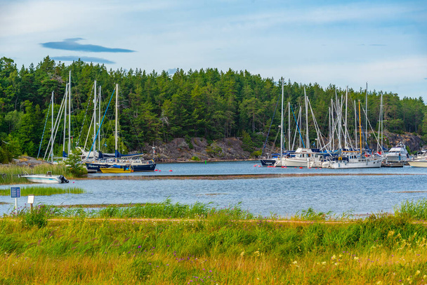 Boats mooring nearby Lacko Castle in Sweden. - Φωτογραφία, εικόνα