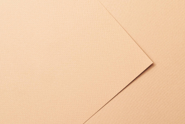 Rough kraft paper pieces background, geometric monochrome paper texture beige color. Mockup with copy space for text - Photo, Image