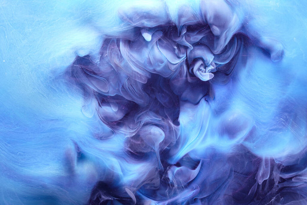 Blue contrast liquid art background. Paint ink explosion, abstract clouds of smoke mock-up, watercolor underwater - Photo, image