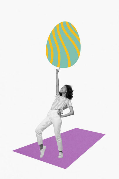 Postcard greetings of young excited woman dancing have fun playing with april springtime easter colored egg isolated on white background. - Foto, Imagen