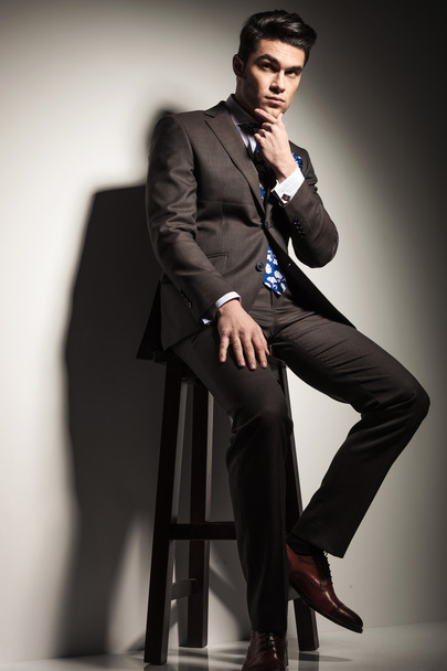  business man sitting on a stool  - Photo, Image