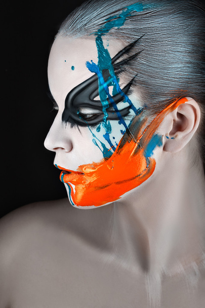 Portrait in profile with streaks of paint. - Valokuva, kuva