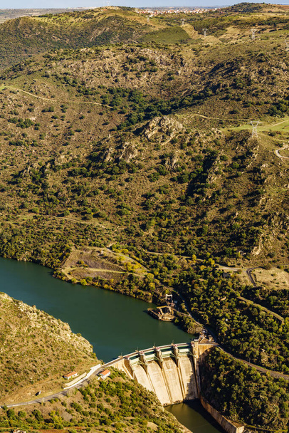 Mountain landscape and Douro river with spanish Saucelle Dam. Border between Portugal and Spain. National Park. View from portuguese Penedo Durao lookout. - Foto, Bild