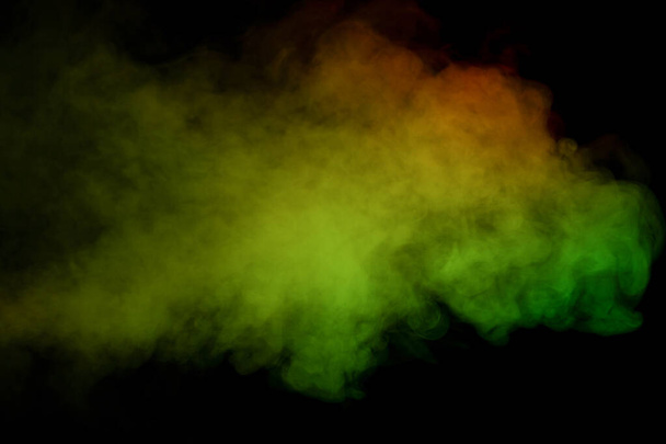 Red and green steam on a black background. Copy space. - Фото, зображення