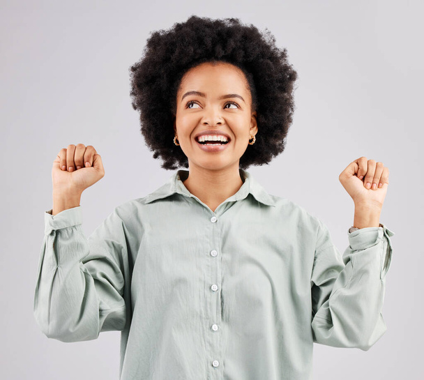 Excited, cheer and face of black woman in studio with winning, achievement and celebration for good news. Success, advertising and isolated girl on white background happy for deal, sale and discount. - Foto, immagini