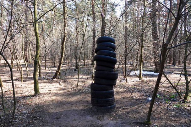 Kiev, Ukraine March 25, 2020: a home-made sports ground in the forest, where people play sports - 写真・画像