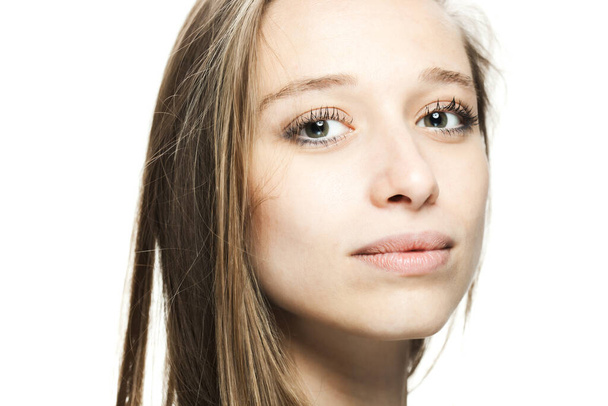 happy positive brunette girl studio portrait against white background. - Фото, изображение