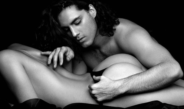 Beautiful couple. Handsome curly man. Romantic and love. Young and cocky lovers. Concept of beauty. Big sexy ass beautiful girl. Model with perfect sensual figure - Фото, изображение