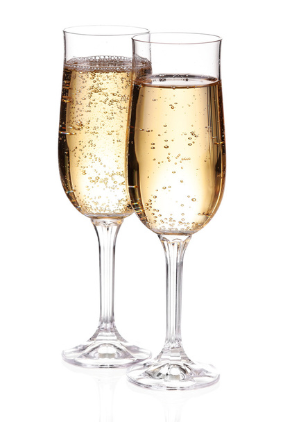 Two glasses with champagne. Isolated on white with clipping path. - Photo, Image