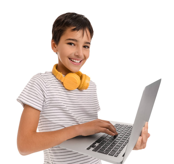 Little boy using laptop on white background - Φωτογραφία, εικόνα