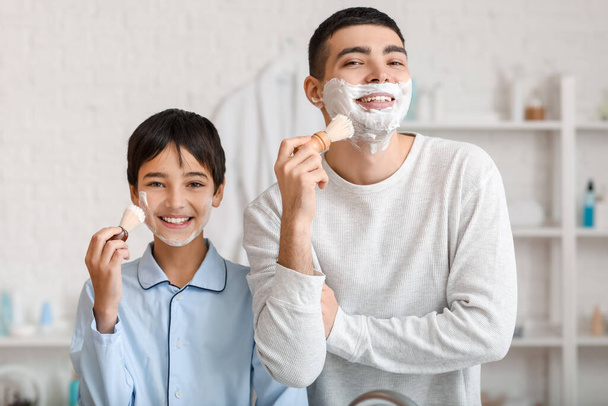 Morning of father and his little son shaving in bathroom - Zdjęcie, obraz
