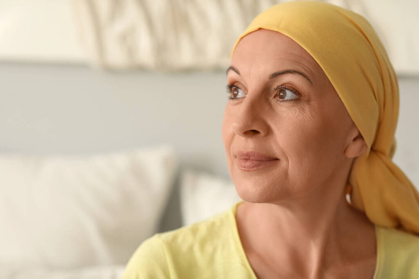 Mature woman after chemotherapy in bedroom, closeup - Photo, Image