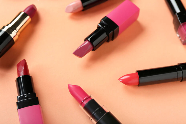 Set of different lipsticks on color background, closeup - Foto, Bild