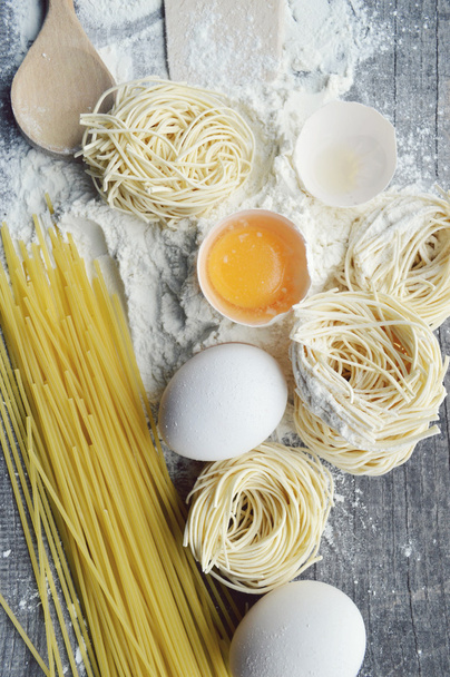 Still life with raw homemade pasta and ingredients for pasta - Φωτογραφία, εικόνα