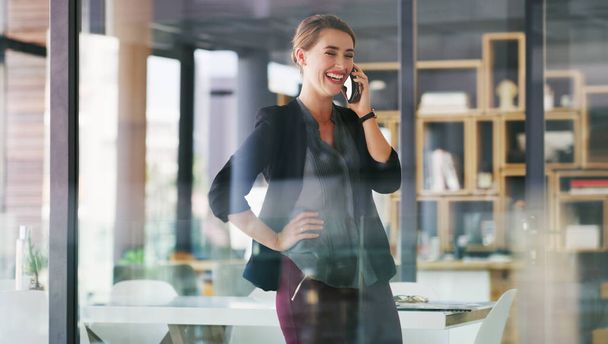 Great Thank you for your time. an attractive young businesswoman standing alone in her office and talking on her cellphone - Fotoğraf, Görsel