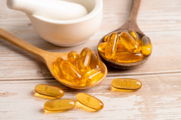 Fish oil Omega 3 capsules vitamin with EPA and DHA isolated on white background. - Valokuva, kuva