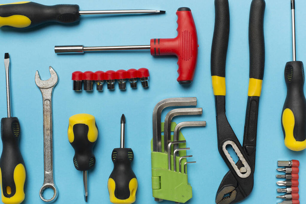 Set of tools on color background, top view - Photo, Image
