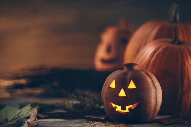 halloween pumpkin jack lantern with burning candle  - Foto, afbeelding