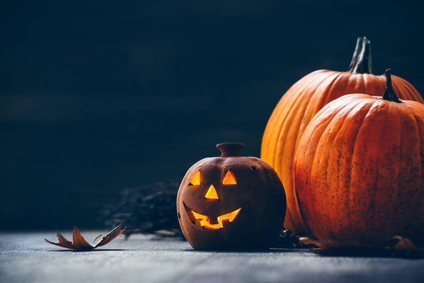 halloween pumpkin jack lantern with burning candle  - Zdjęcie, obraz