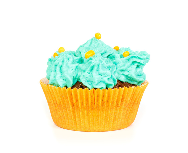Cupcake met blauwe crème glazuur - Foto, afbeelding