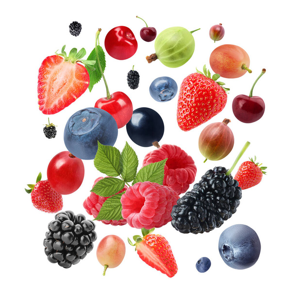 Many different fresh berries falling on white background - Φωτογραφία, εικόνα