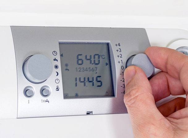 Thermostat de chaudière de programmation
 - Photo, image