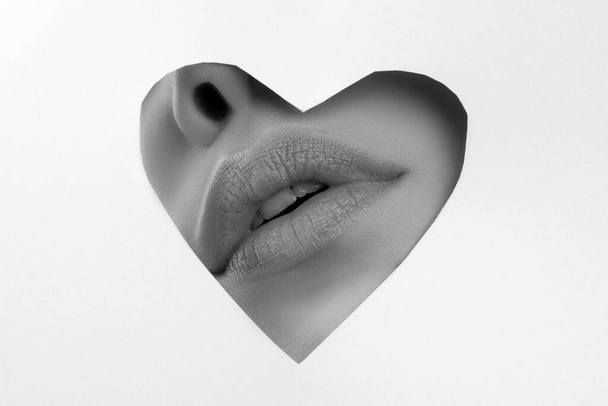 Lipscare. Nude makeup. Woman lip through hole in paper. Copy Space for advertising. Fashion beauty. Make-up and cosmetics - Photo, Image