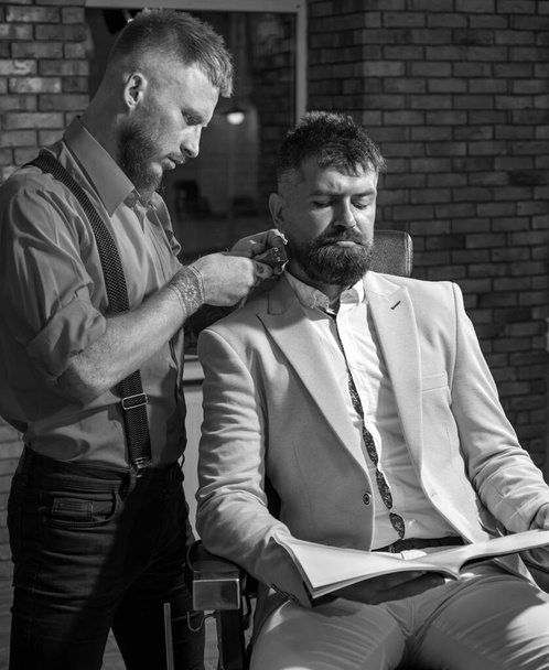 Styling with shaver. Barber scissors. Shaving man and razor man. Barber shop tools on old wooden background with copy space. Barber shop design. Hair Stylist and Barber. Bearded man or hipster - Fotoğraf, Görsel