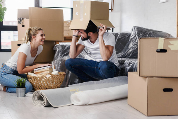 young couple moving into new home  - Фото, изображение
