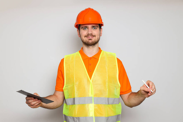 Young man civil engineer in safety hat - 写真・画像