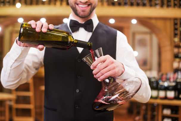 Man pouring red wine - Photo, image