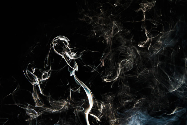 Smoke effect texture. Isolated background. Black and dark backdrop. Smokey fire and mistic effect. Spirit wave. Photo realistic mist stock image. - Valokuva, kuva