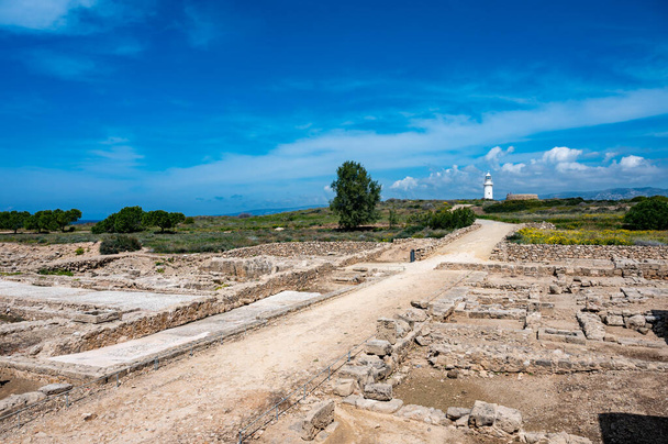 Paphos, Paphos District, Cyprus - March 23 , 2023 - Landscape view over the ruins of Nea Paphos against blue sky - Photo, image