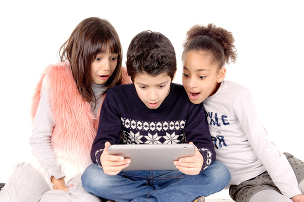 Friends playing with tablet - Фото, зображення