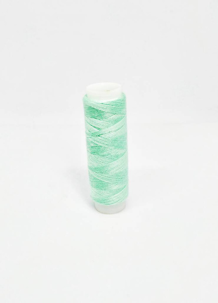 sewing thread on white background. - Fotó, kép