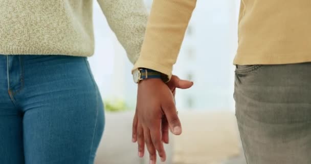 Holding hands, couple and home of a woman and man together showing love, trust and faith support. House, marriage solidarity and happy people with blurred background, hope and care in a household. - Footage, Video