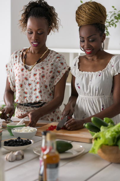 Two Young African Women Cooking - Foto, Imagen