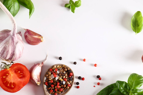 food background with fresh garlic herbs on white background - Photo, Image
