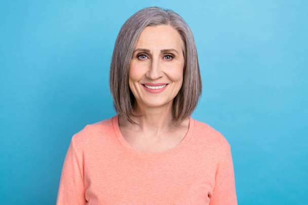 Portrait photo of smiling pretty retired old woman gray hair wear stylish shirt satisfied her own business company isolated on blue color background. - Foto, afbeelding