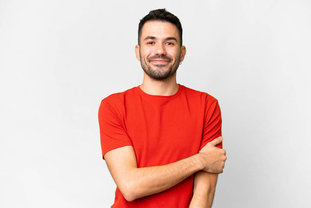 Young handsome caucasian man over isolated white background laughing - Fotó, kép