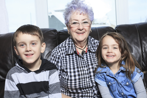Portrait of smiling multigeneration family spending leisure time - Valokuva, kuva