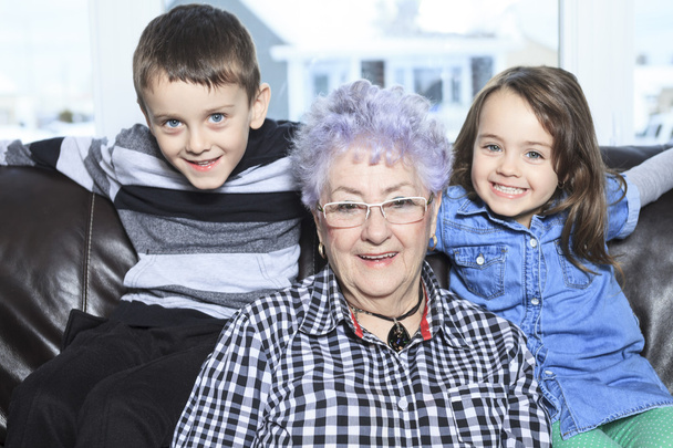 Portrait of smiling multigeneration family spending leisure time - Valokuva, kuva