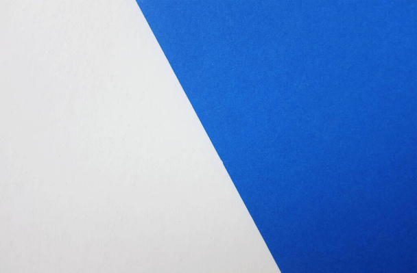 two tone blue white paper color for background. Two color paper with Overlay on the floor And split half of the image. background.Top view with place for text - Φωτογραφία, εικόνα
